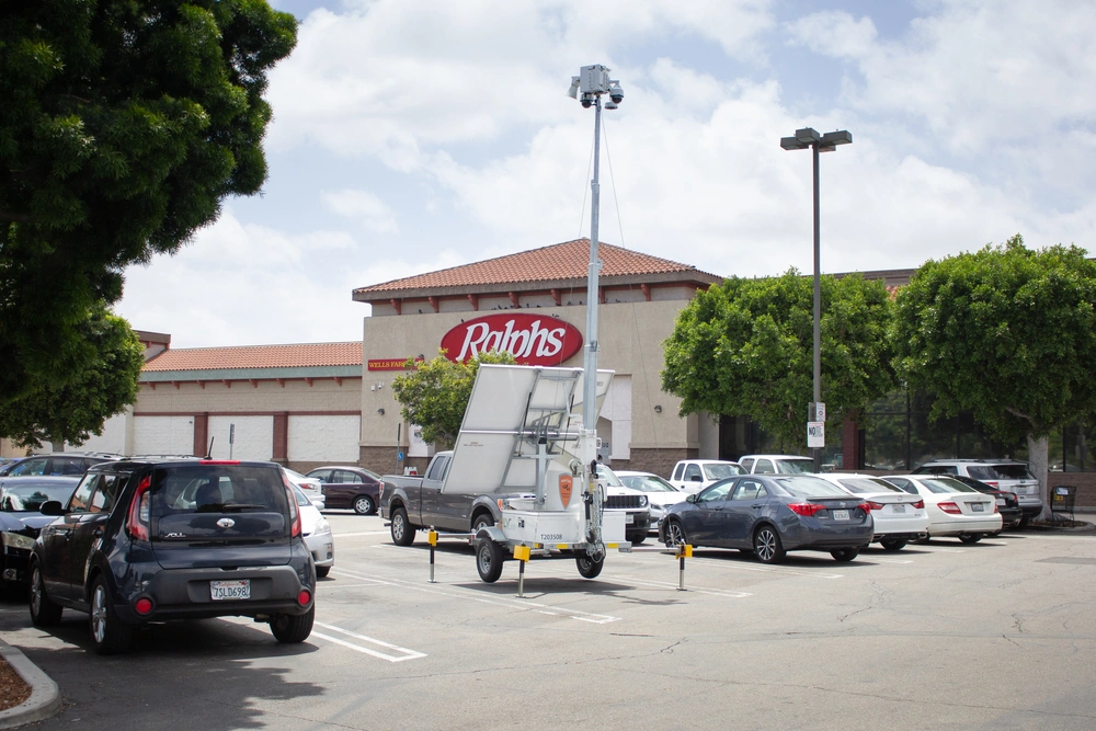 LiveView Tech surveillance trailer securing a busy parking lot area